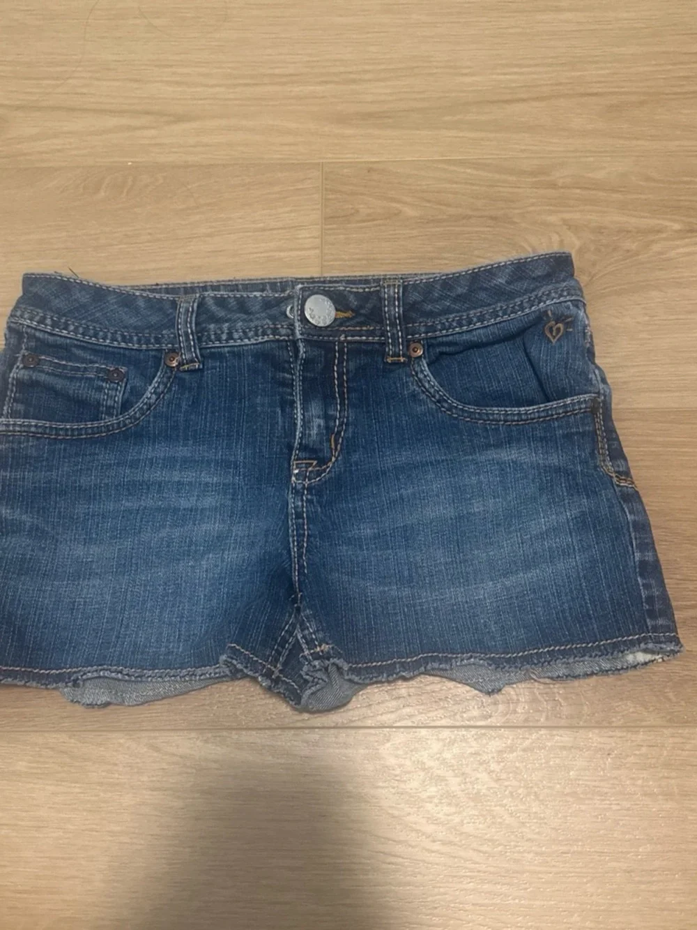 Denim Cutoff Shorts in Medium Blue